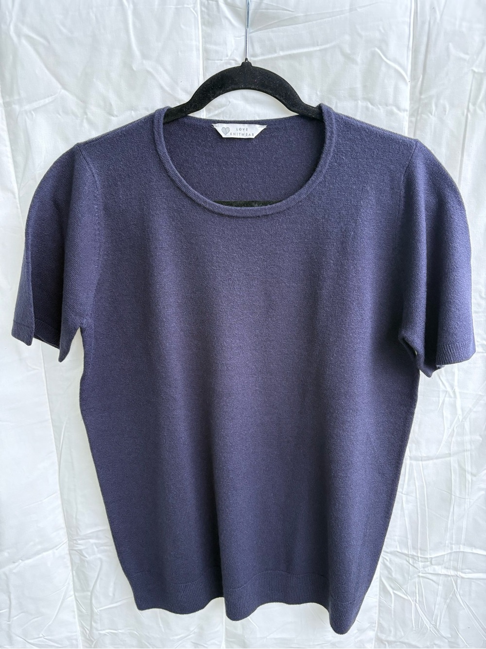 Love Knitwear shorts sleeve knit sweater in Navy Blue. Size US10